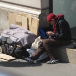 A beggar preparing for the morning.